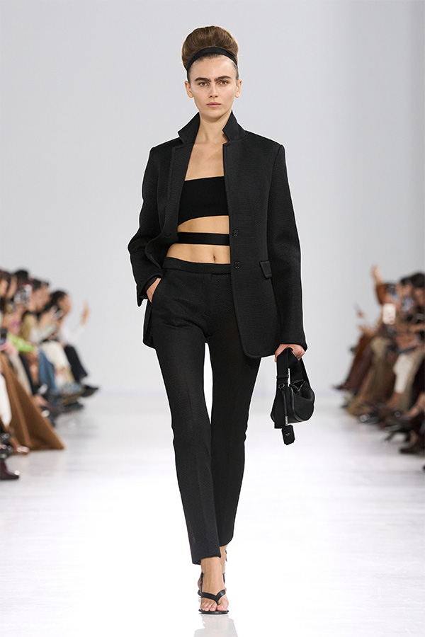 Max Mara Spring/Summer 2026 Fashion Show - Look with Blazer, Bandeau Top and matching black Trousers and black bag.